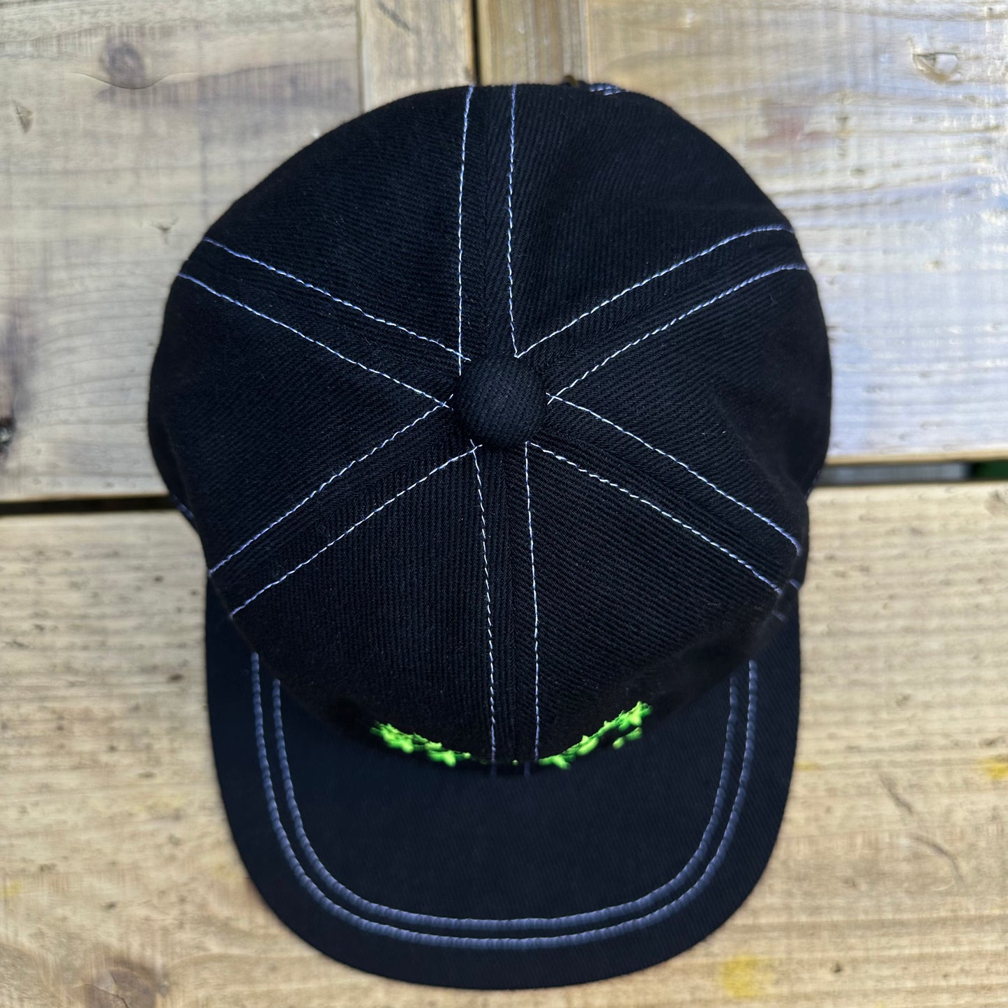 izon logo cap black x yellow