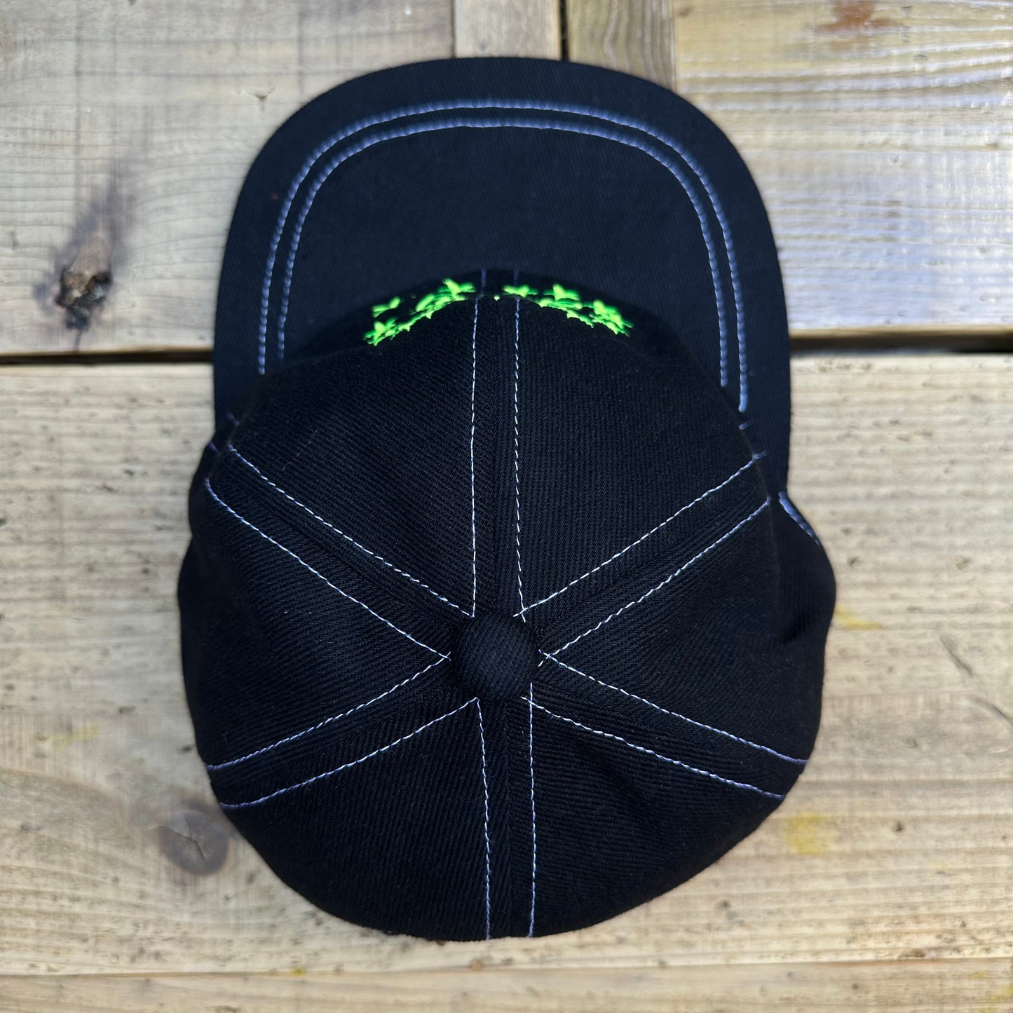 izon logo cap black x yellow