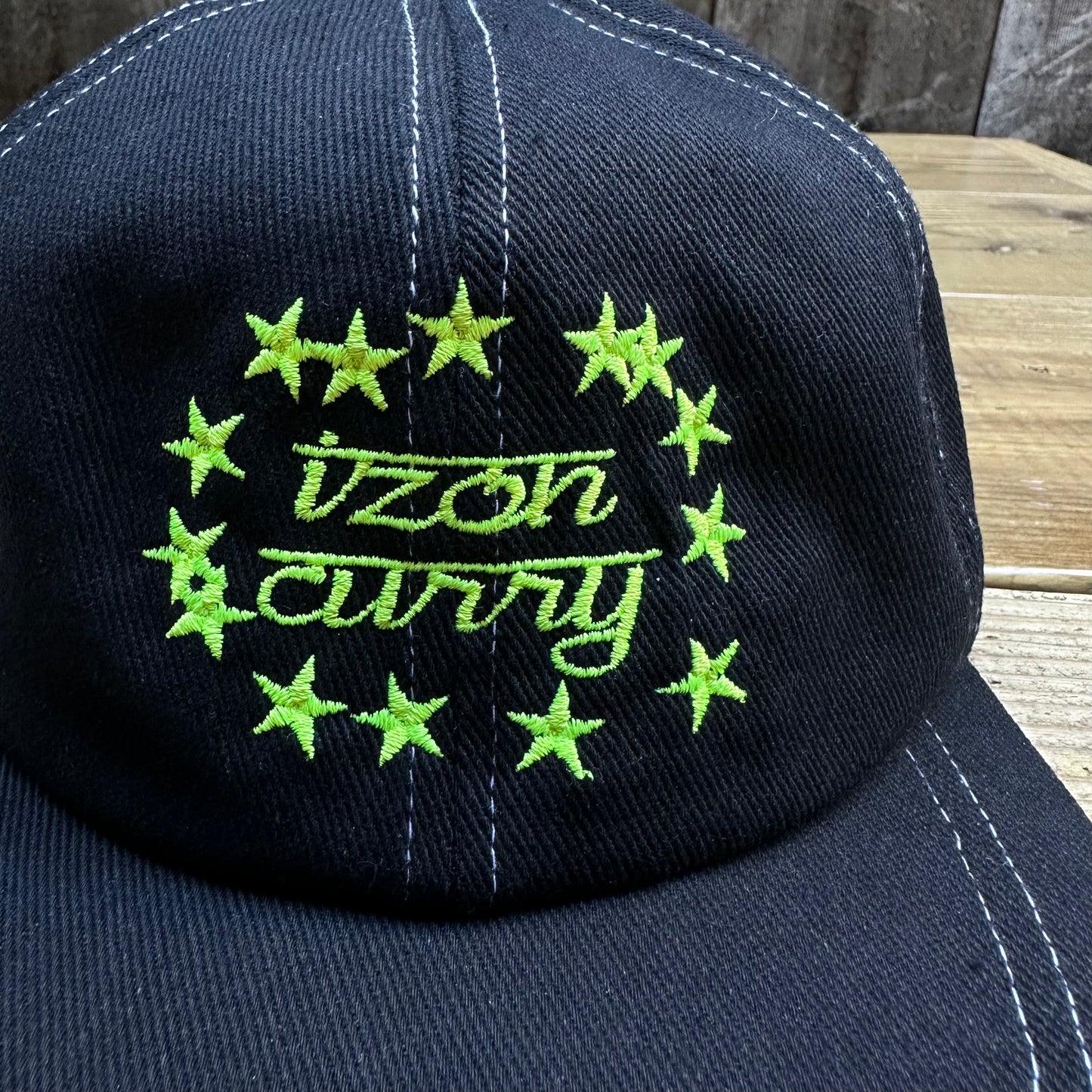 izon logo cap black x yellow
